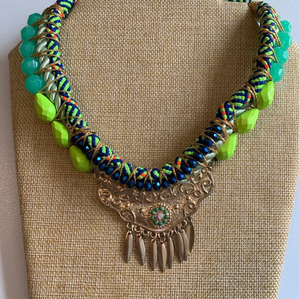 Unique hand made bib necklace in vibrant colors with mixed media.